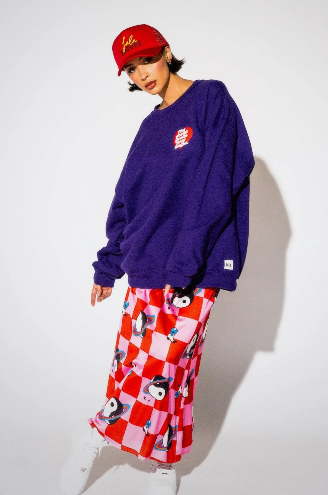 The World Needs Your Magic Heart Puff Print Pullover in Grape Soda